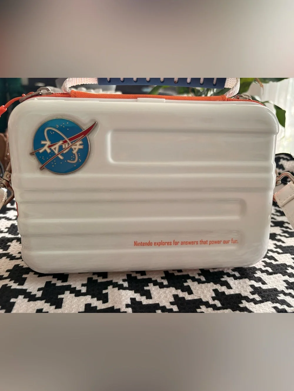 Nintendo White Portable Game Case with Blue Handle and Orange Trim